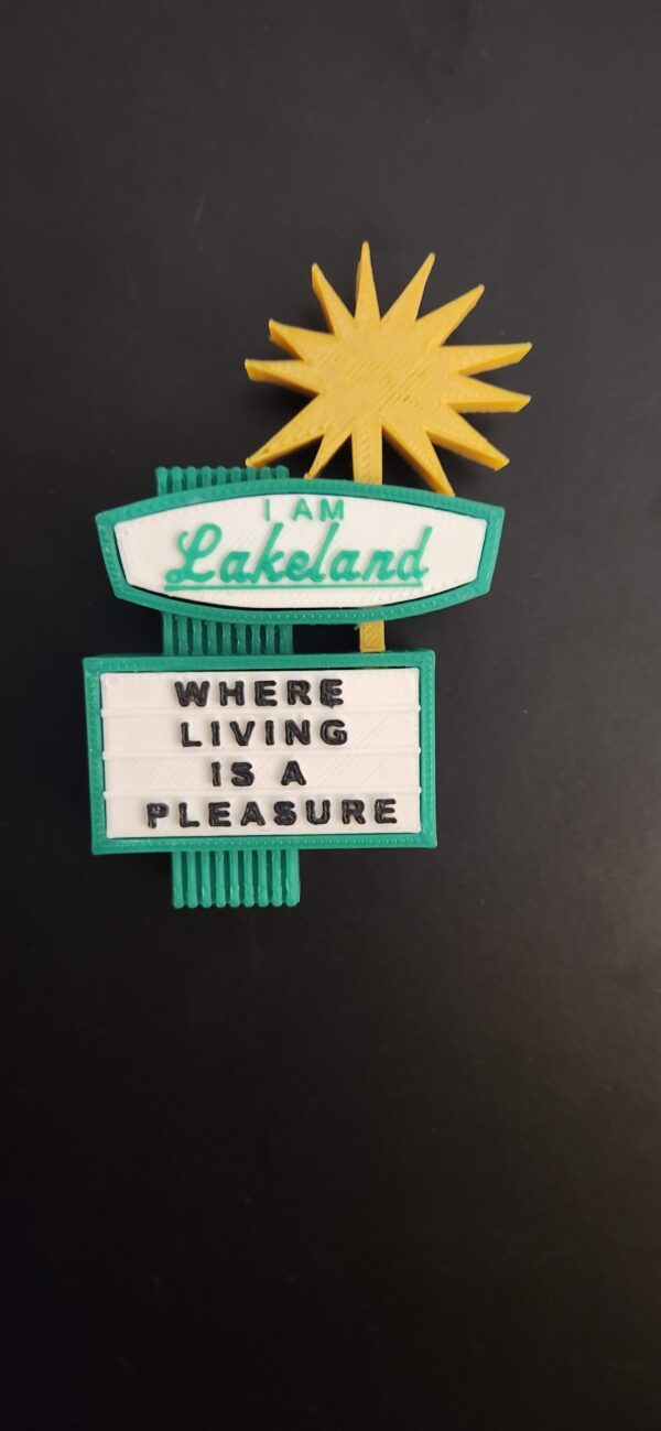 Lakeland, FL souvenir magnet featuring the iconic dry cleaners sign which is known to display humorous phrases each week.