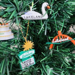 Set of 4 Lakeland, FL Christmas Ornaments featuring the Southgate Arch, dry cleaners sign, birthday cake tower and swan