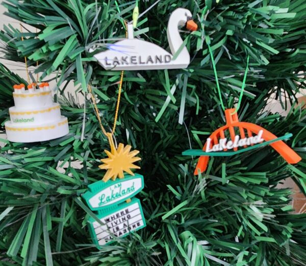 Set of 4 Lakeland, FL Christmas Ornaments featuring the Southgate Arch, dry cleaners sign, birthday cake tower and swan