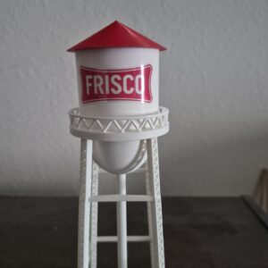 3D printed Frisco Texas water tower replica with white tank, red roof, and “FRISCO” logo on elevated structure