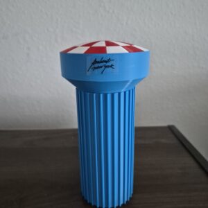 3D printed replica of the Amherst, New York water tower with a blue pillar and red-and-white peppermint-style top displayed on a tabletop.