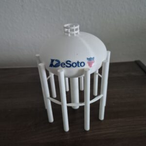 DeSoto Texas water tower replica with white spheroid tank, DeSoto logo, All-America City emblem, and multi-column support structure.